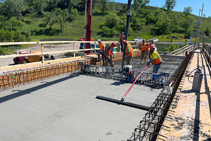 The concrete was poured in late June for the deck on spans 1 and 2 (on the top of bridge). 