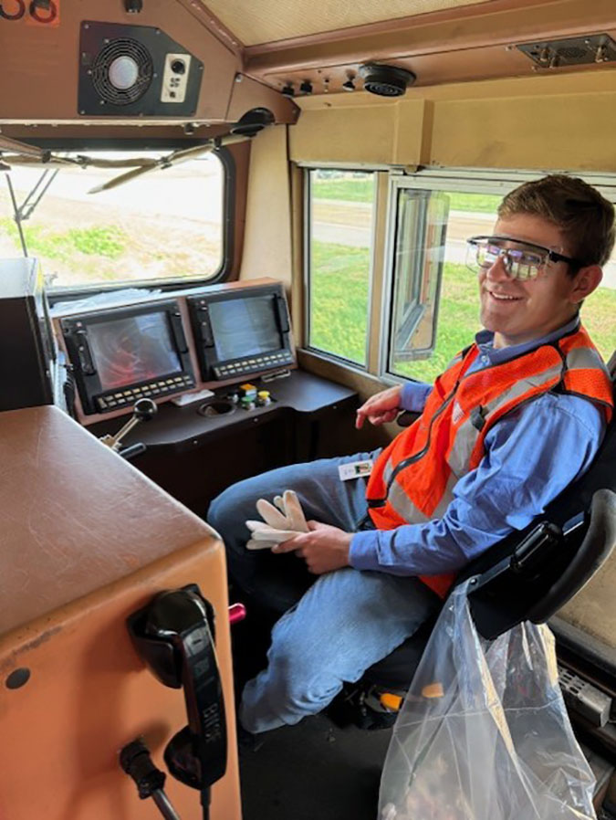 Luke Miller in the locomotive engineer’s seat 